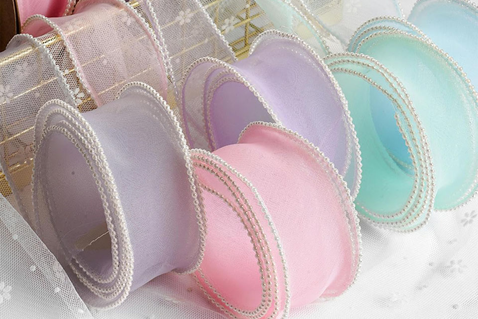 Organza ribbon flowers crafted for wedding and event decor